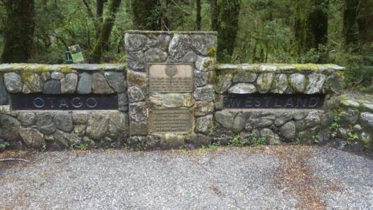 Haast pass sign -the border between Otago and Westland.