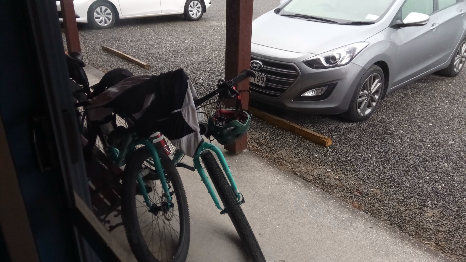 Our bikes in front of our second stay in Haast.