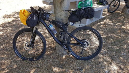 Packed mountainbike with bikepacking equipment.