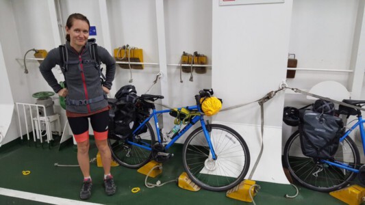 Alina next to the bikes on the ferry from Beppu to Shikoku.