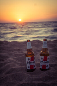 Two bottles of Ichnusa beer at the beach near camping Nurapolis.