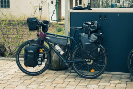A bike packed with panniers and frame bag - Patria Kosmos.