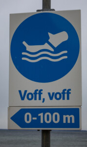 Sign for the dog beach in Sweden.