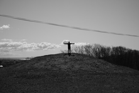 Alex standing on a hill from the old settlement near Båstad.