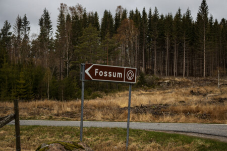 Carvings at Fossum - World Heritage Tanum. Direction sign.