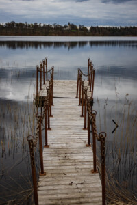 A brigde with iron railings at lake Lilla Le in Ed.