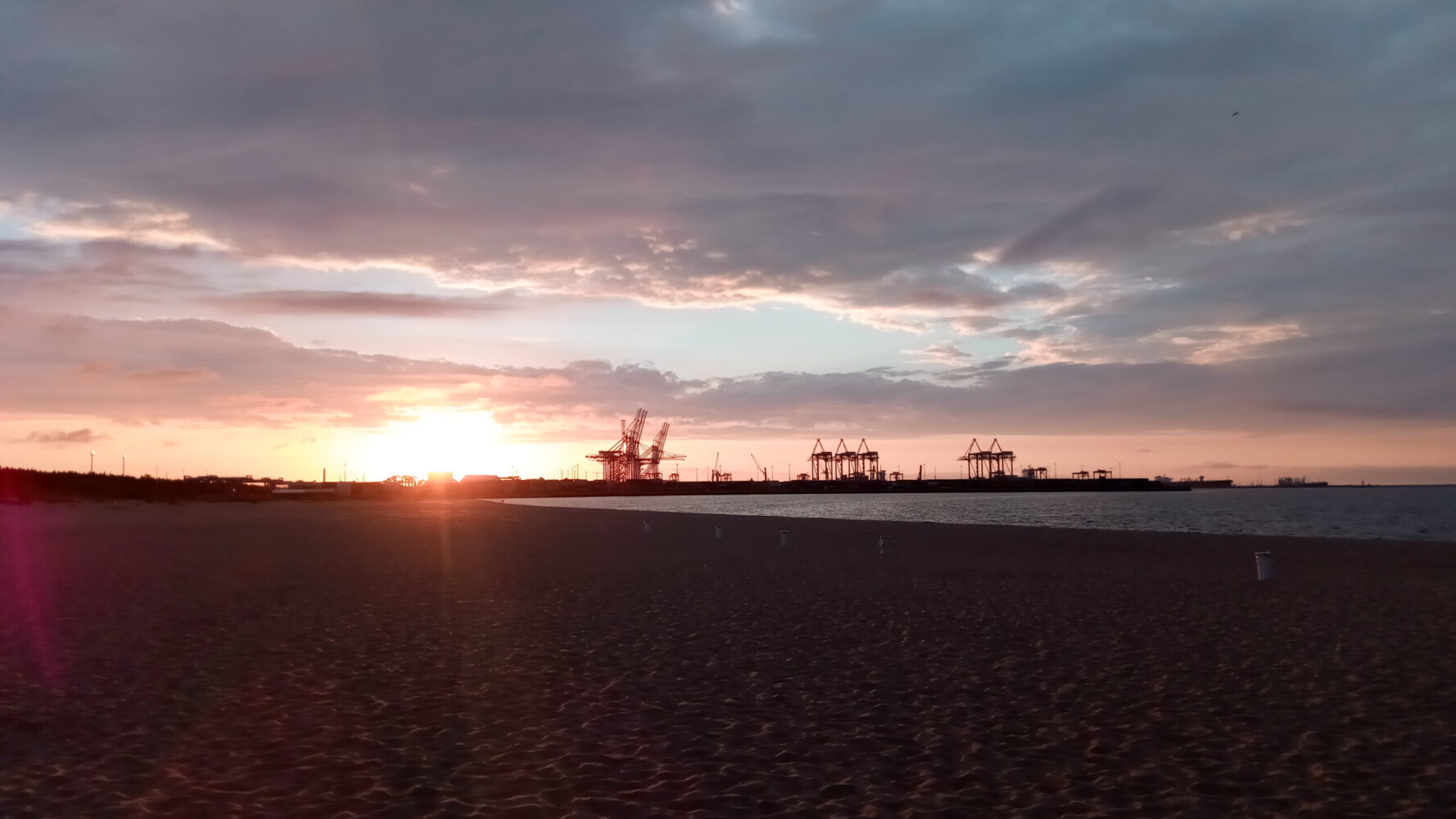 Industry romantic - sundown at Stogi beach in Gdańsk.