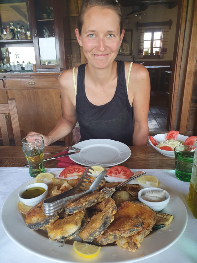 Alina happy with our enormous lunch at the eco ethno farm.
