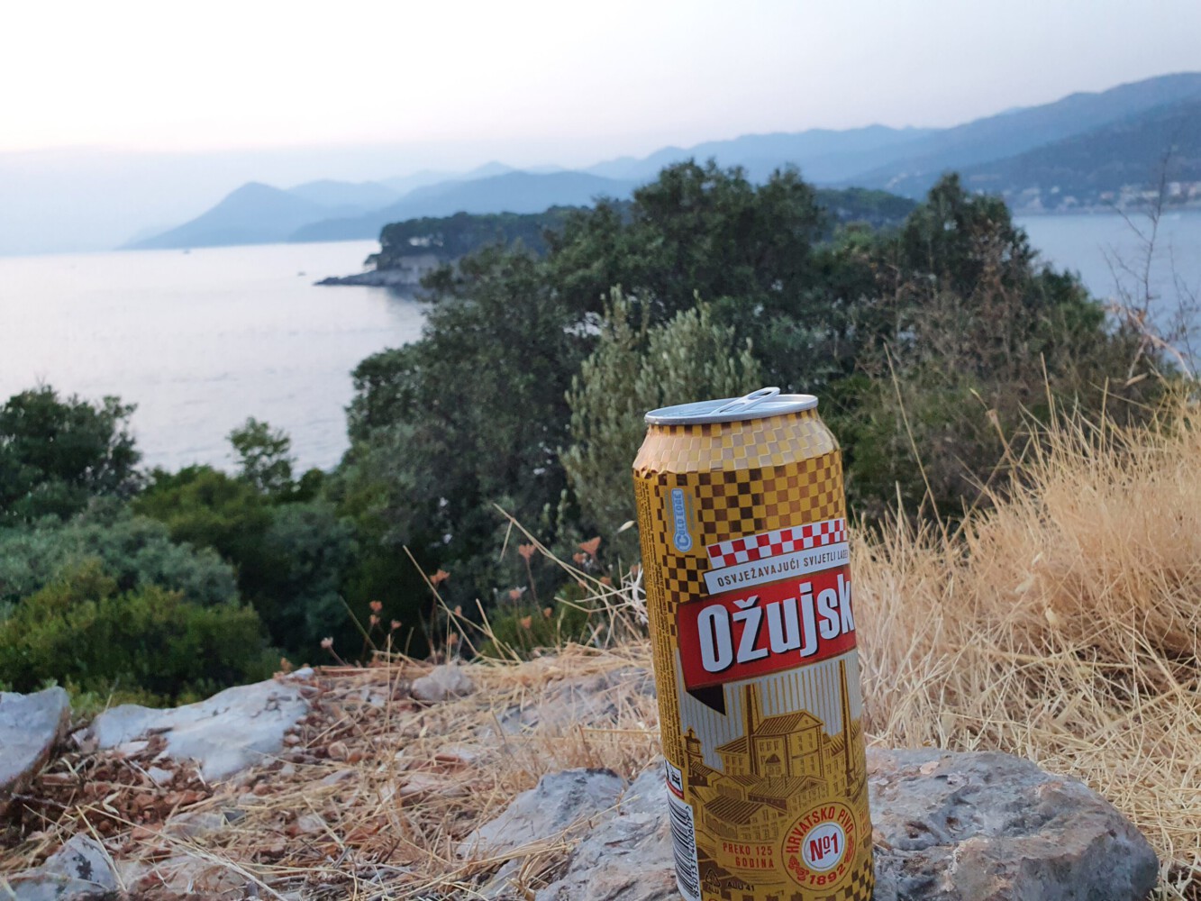 Delicious beer in front of the adriatic sea.